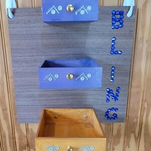 Handmade Decorative Wall-Mounted Storage Organizer with Purple and Gold Drawers